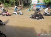 Kiat mengendarai sepeda motor listrik semasa banjir